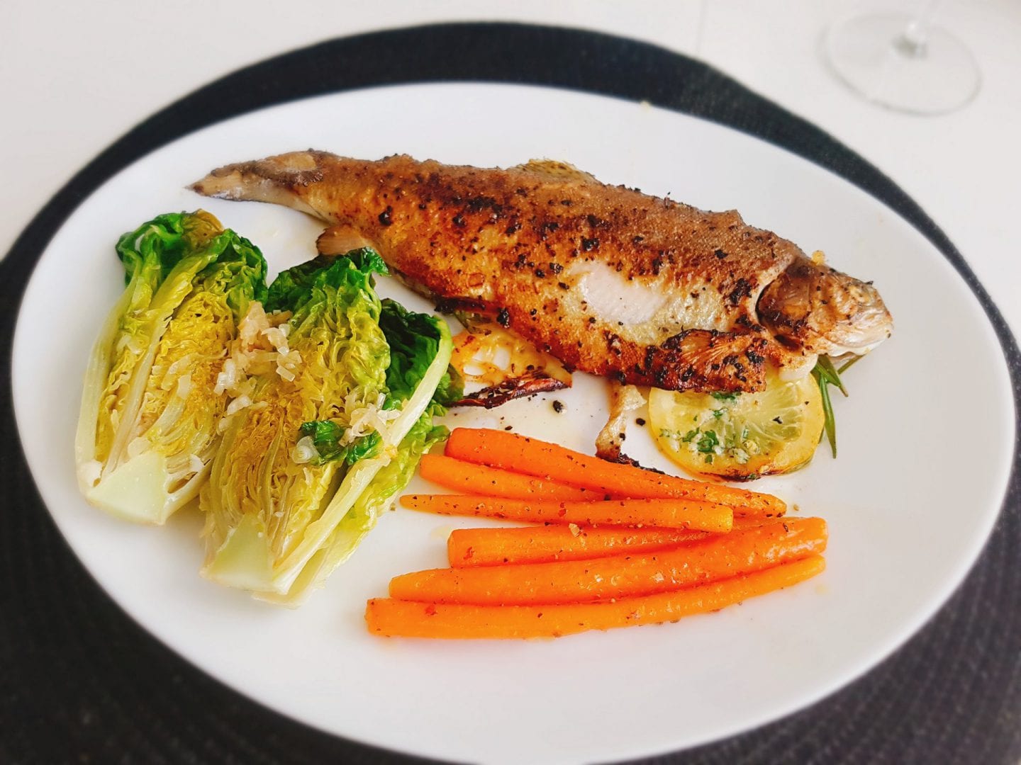 Fried trout with vegetables